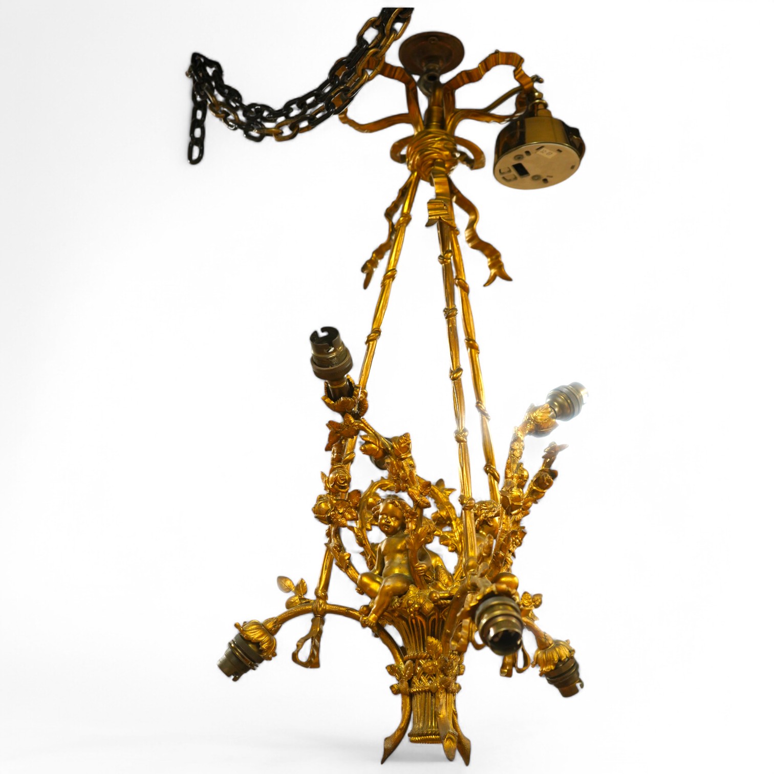 A gilt metal chandelier in the form of a cherub in a basket, 65cm high. Condition - fair, untested